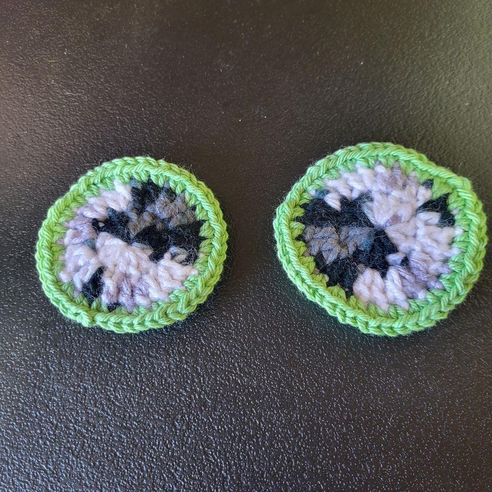 Handcrafted Green and Black Crochet Coasters For Your Car Are Home.